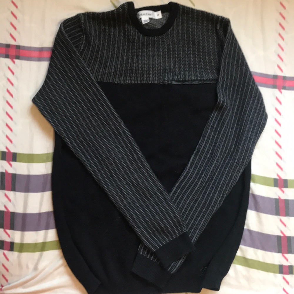 Calvin klen sweater or top.